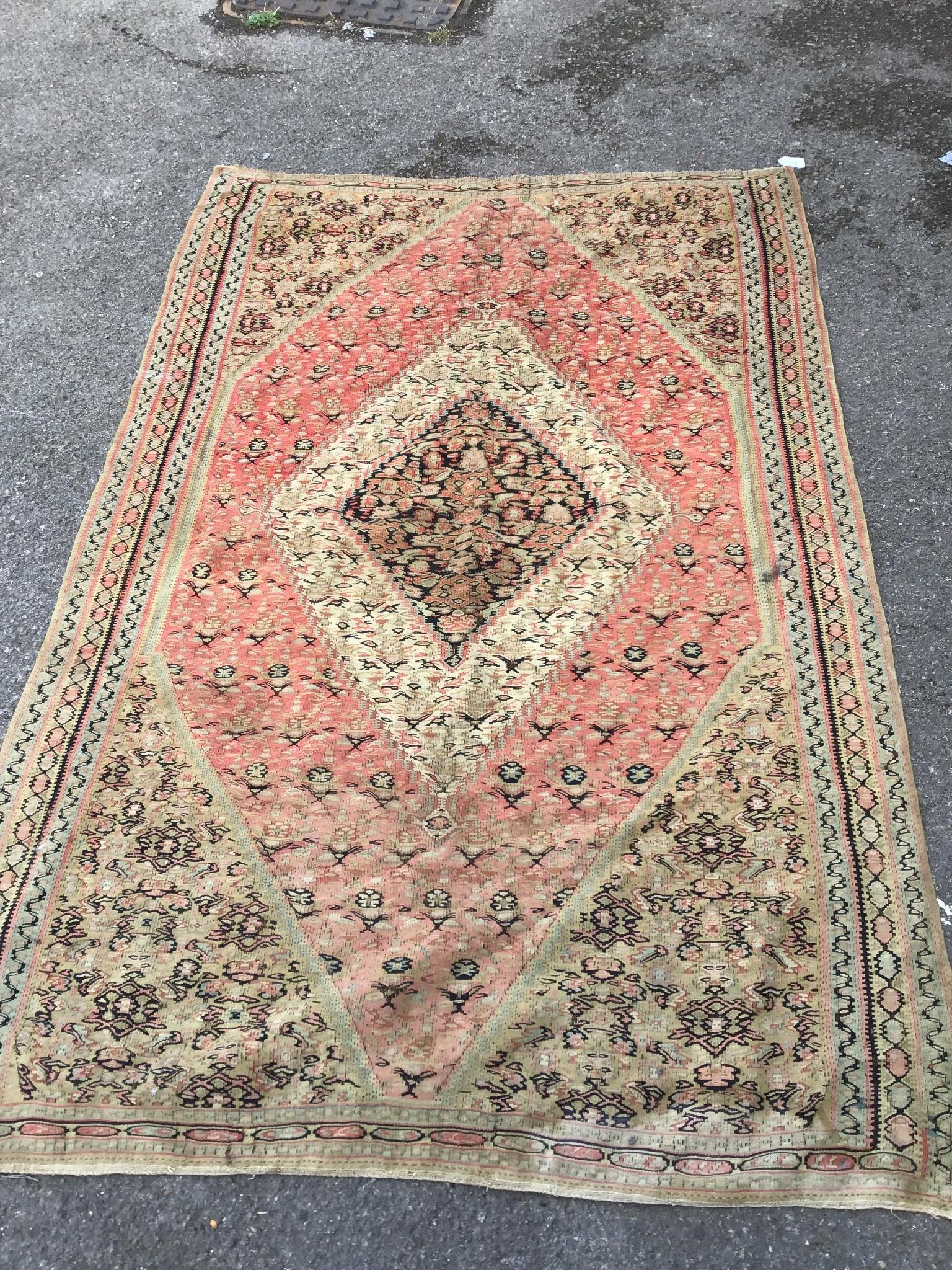 A brick ground rug, 196 x 130cm